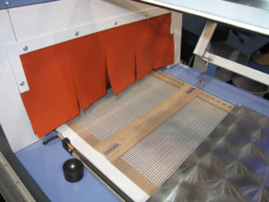 PTFE conveyor belt for heat shrink packaging